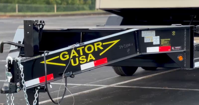 Aardvark 21K triple-axle tilt-bed trailer, deck tilted to the ground